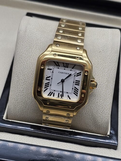 Cartier dama — esfera blanca cuadrada y brazalete dorado