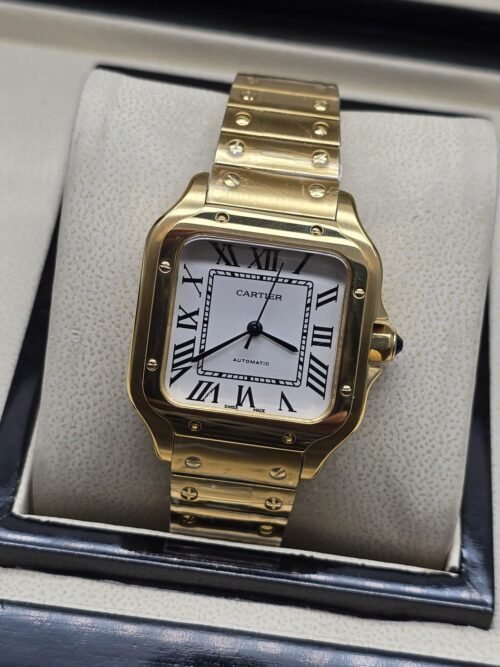 Cartier dama — esfera blanca con números romanos y caja dorada
