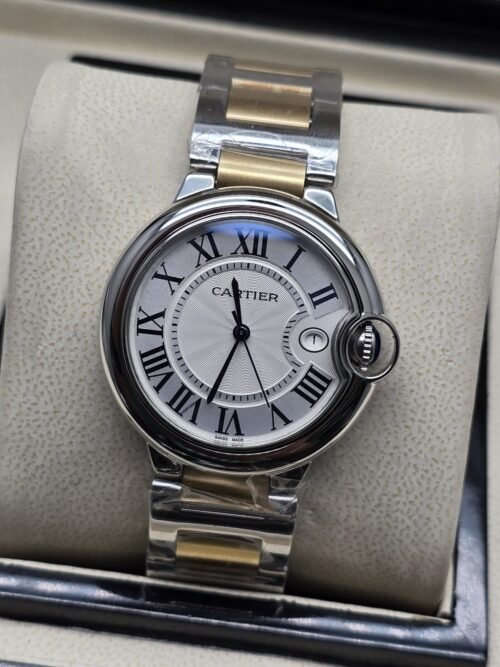 Cartier dama — esfera blanca redonda y brazalete bicolor dorado