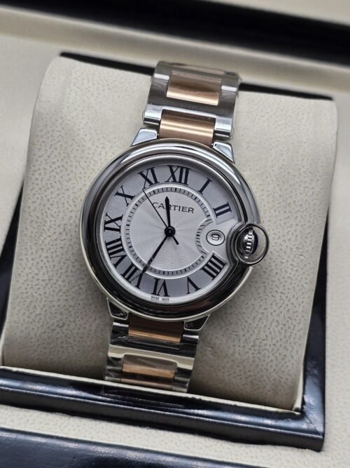 Cartier dama — esfera blanca redonda y brazalete bicolor rosado