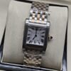 Cartier dama — esfera blanca rectangular y brazalete bicolor dorado