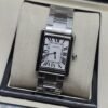 Cartier dama — esfera blanca rectangular y bisel negro