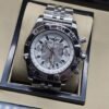 Breitling — esfera plateada con subesferas y brazalete plateado