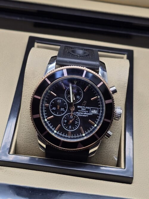 Breitling — esfera negra con subesferas y correa negra