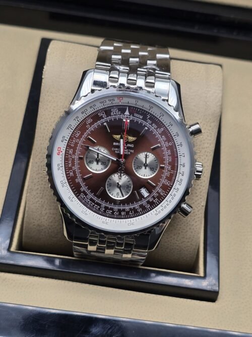 Breitling — esfera marrón con subesferas y brazalete plateado