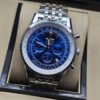 Breitling — esfera azul con subesferas y brazalete plateado