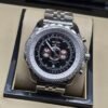 Breitling — esfera negra con subesferas y bisel texturizado