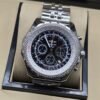 Breitling — esfera negra con subesferas y brazalete de eslabones