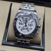 Breitling — esfera plateada con subesferas y bisel plateado