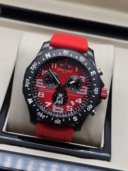 Breitling — esfera roja y correa roja