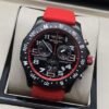 Breitling — esfera negra con detalles rojos y correa roja