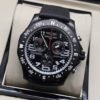 Breitling — esfera negra deportiva y correa negra