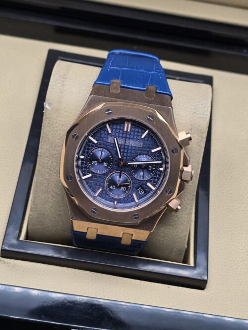 Audemars Piguet — esfera azul con subesferas y caja dorada