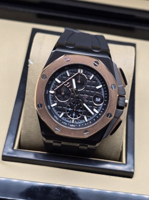 Audemars Piguet — esfera negra con subesferas y bisel rosado
