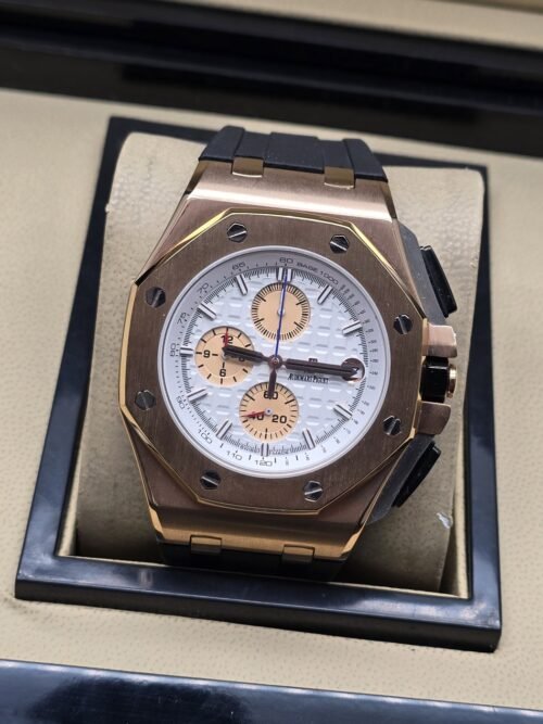 Audemars Piguet — esfera blanca con subesferas doradas y caja rosada