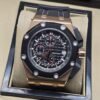 Audemars Piguet — esfera negra abierta y caja bicolor