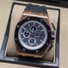 Audemars Piguet — esfera negra con subesferas y caja rosada