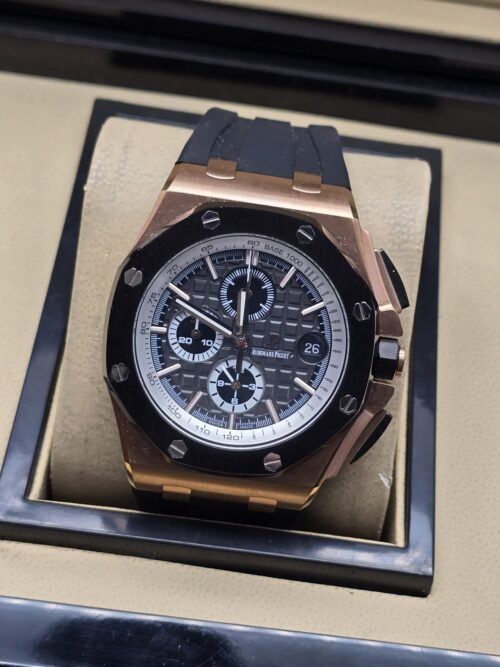 Audemars Piguet — esfera negra con subesferas y caja rosada