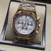 Audemars Piguet — esfera clara con subesferas y brazalete dorado multicolor