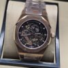 Audemars Piguet — esfera abierta negra y brazalete rosado