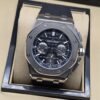 Audemars Piguet — esfera negra texturizada con subesferas y caja plateada