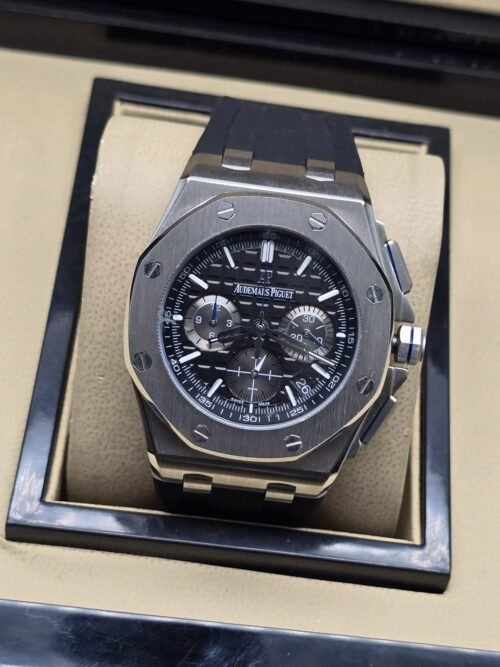 Audemars Piguet — esfera negra texturizada con subesferas y caja plateada