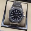 Audemars Piguet — esfera negra de índices blancos y brazalete plateado