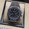 Audemars Piguet — esfera negra con subesferas y brazalete plateado