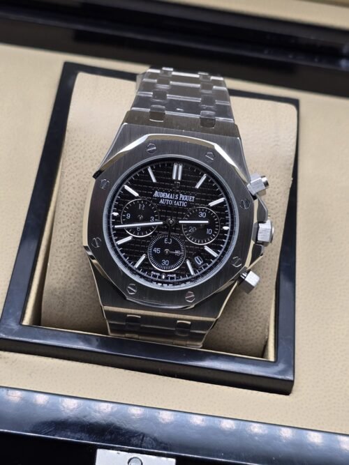 Audemars Piguet — esfera negra con subesferas y brazalete plateado