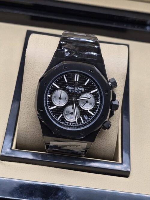 Audemars Piguet — esfera negra con subesferas claras y brazalete oscuro