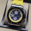 Audemars Piguet — esfera azul con subesferas y correa amarilla