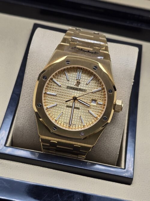Audemars Piguet — esfera dorada y brazalete dorado