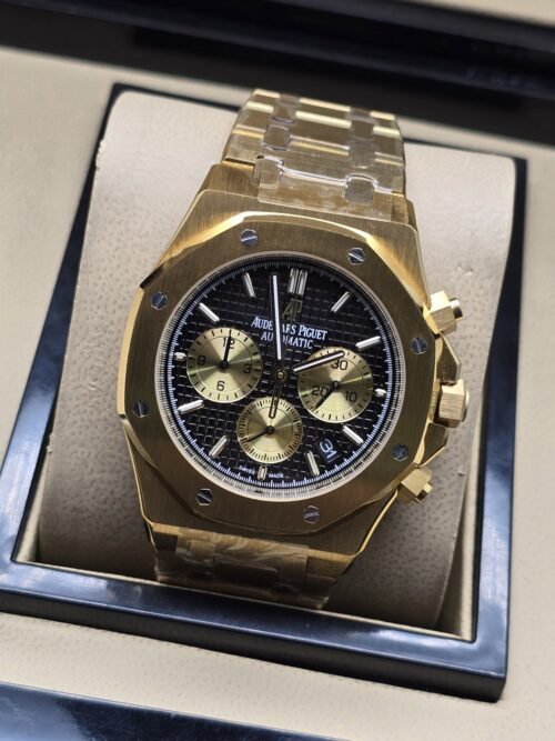 Audemars Piguet — esfera negra con subesferas doradas