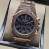 Audemars Piguet — esfera negra con subesferas y caja rosada