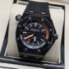 Audemars Piguet — esfera negra con detalles naranjas y caja negra