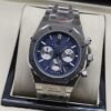 Audemars Piguet — esfera azul con subesferas claras y brazalete plateado