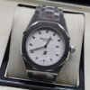 Audemars Piguet — esfera blanca con indicadores brillantes