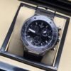 Tissot — esfera negra con subesferas y bisel gris