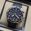 Tissot — esfera negra deportiva y bisel con detalles dorados