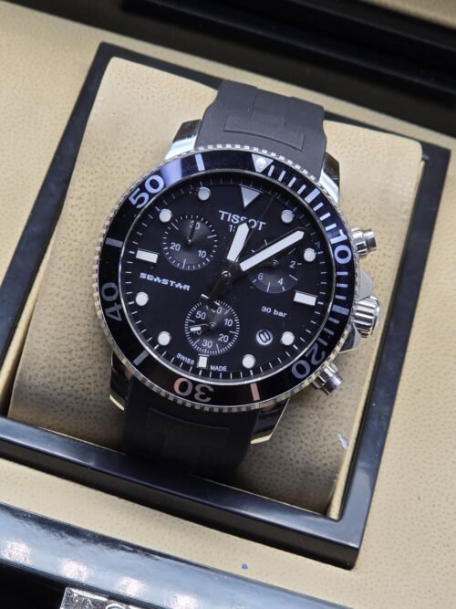 Tissot — esfera negra deportiva y correa negra