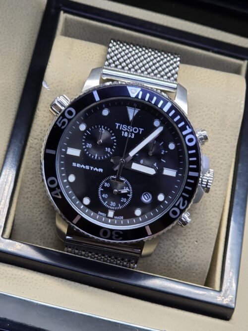 Tissot — esfera negra con subesferas y brazalete de malla