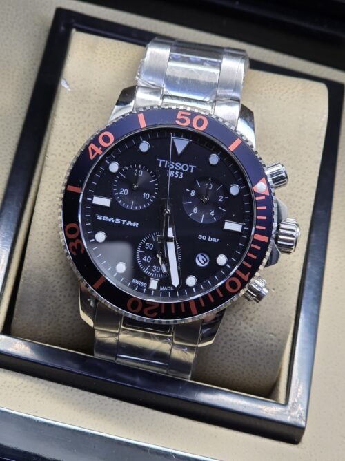 Tissot — esfera negra y bisel deportivo rojo