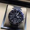 Tissot — esfera negra deportiva con bisel plateado