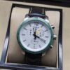 Tissot — esfera blanca y bisel verde