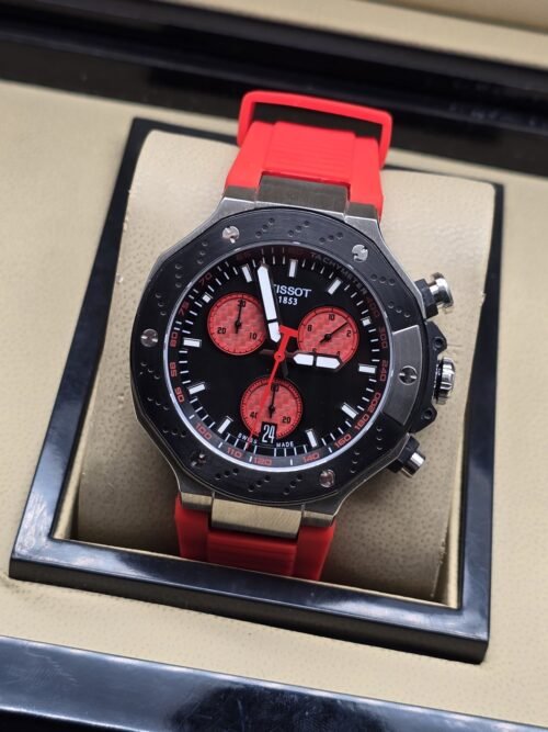 Tissot — esfera negra con subesferas rojas y correa roja