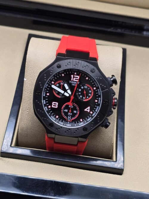 Tissot — esfera negra con números blancos y correa roja