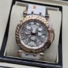 Tissot — esfera clara con subesferas y bisel rosado