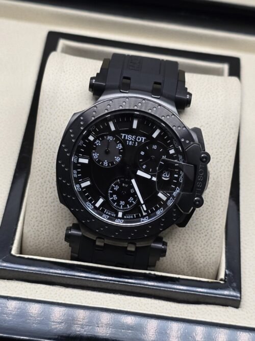 Tissot — esfera negra con subesferas oscuras y correa negra
