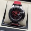 Tissot — esfera negra con detalles rojos y correa roja