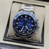 Tissot — esfera azul con subesferas y brazalete plateado